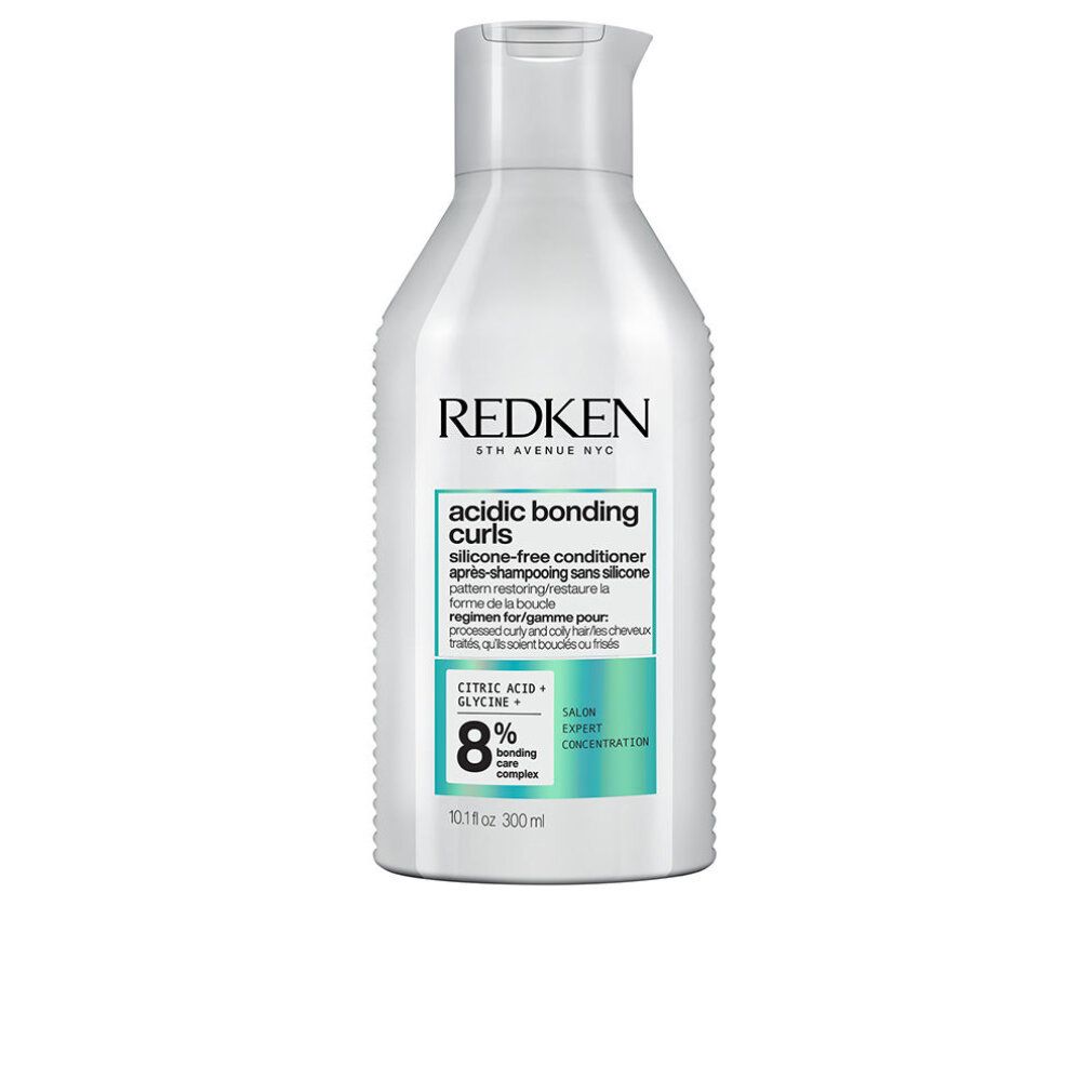 Weiße Flasche mit Klappverschluss. Aufschrift: REDKEN, acidic bonding curls, silikonfreier Conditioner. 8% Zitronensäure.