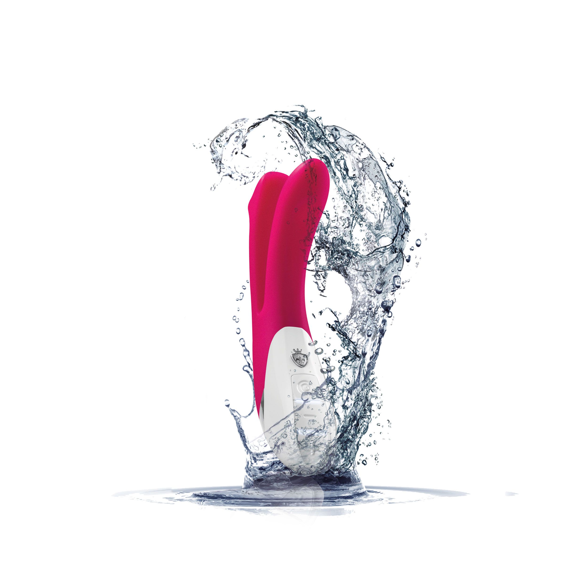 Rosa Vibrator im Wasser. Zwei Köpfe, weißes Bedienfeld. Wasserspritzer.