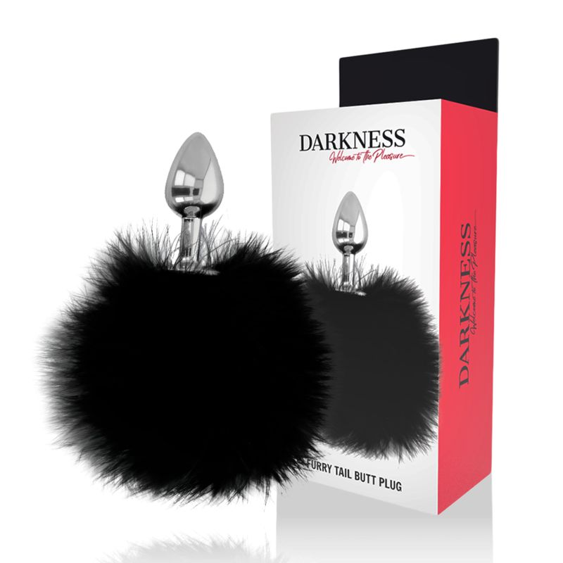 Analplug mit Fellschwanz neben der Verpackung. Aufschrift "DARKNESS" und "FURRY TAIL BUTT PLUG".