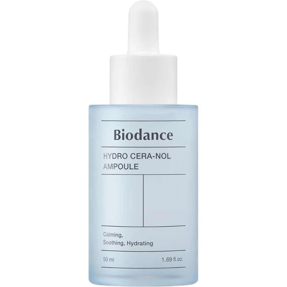 Blau-transparente Flasche mit weißem Deckel und Pipette. Aufschrift: Biodance, HYDRO CERA-NOL, AMPULE. Text: Calming, Soothing, Hydrating. 50 ml, 1.69 fl.oz.