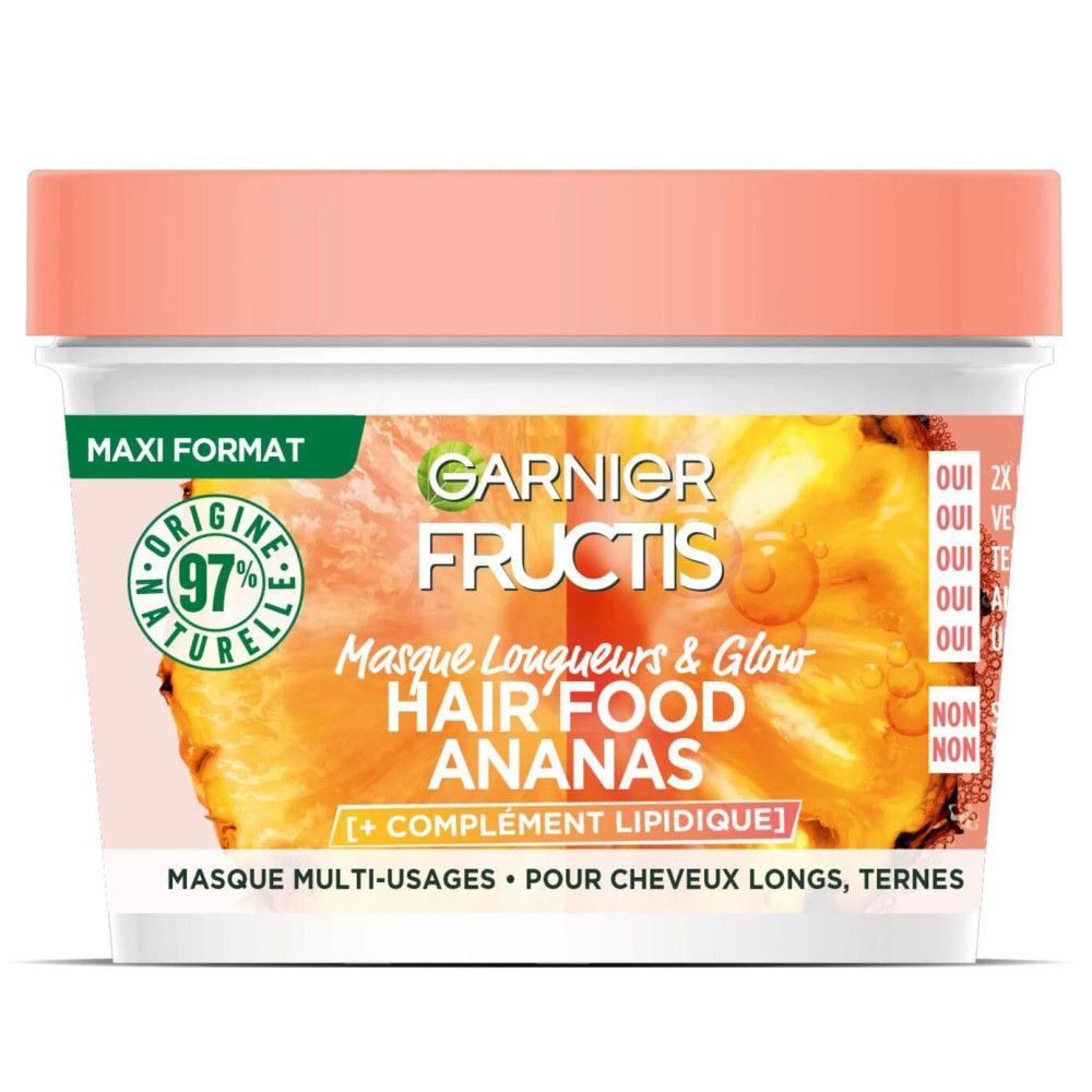 Weißer Tiegel mit rosa Deckel. Aufschrift: Garnier Fructis Hair Food Ananas. Grün-weißer Aufkleber: 97% natürliche Inhaltsstoffe.
