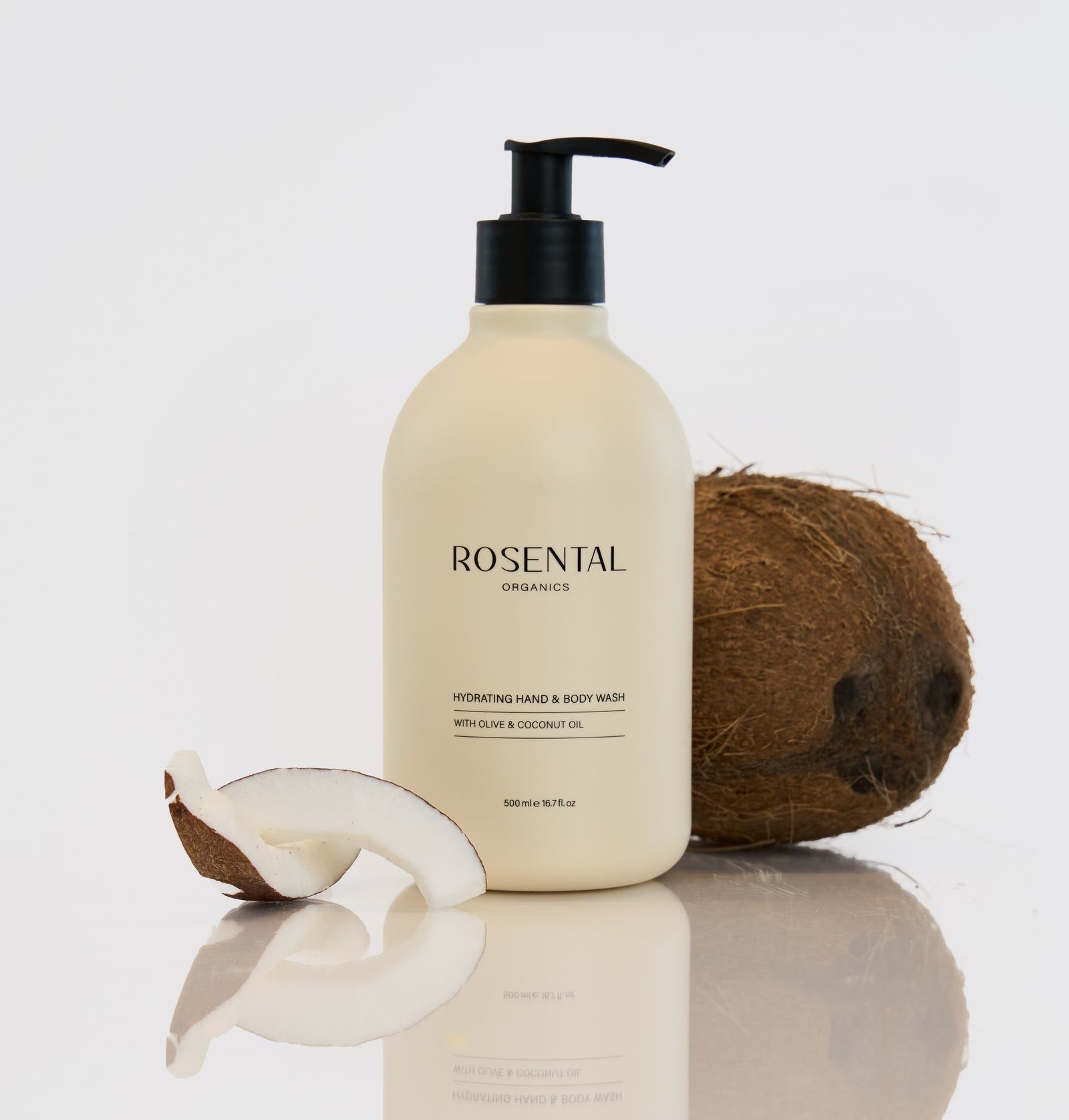Beige Hand- und Körperwaschflasche mit schwarzem Pumpkopf und Kokosnuss. Aufschrift: Rosental Organics, Hydrating Hand & Body Wash.