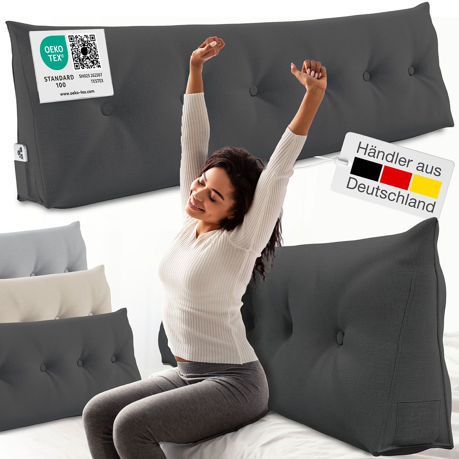 Graues Keilkissen mit Knöpfen. Frau dehnt sich daneben. Text: Oeko-Tex Standard 100. Händler aus Deutschland. Mehrere Kissen in verschiedenen Farben.