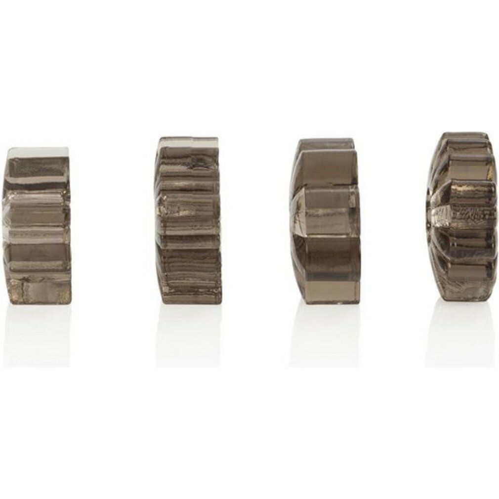 Vier dunkelgraue, geriffelte Enhancer, nebeneinander angeordnet. Sie sind ringförmig mit unterschiedlichen Designs.