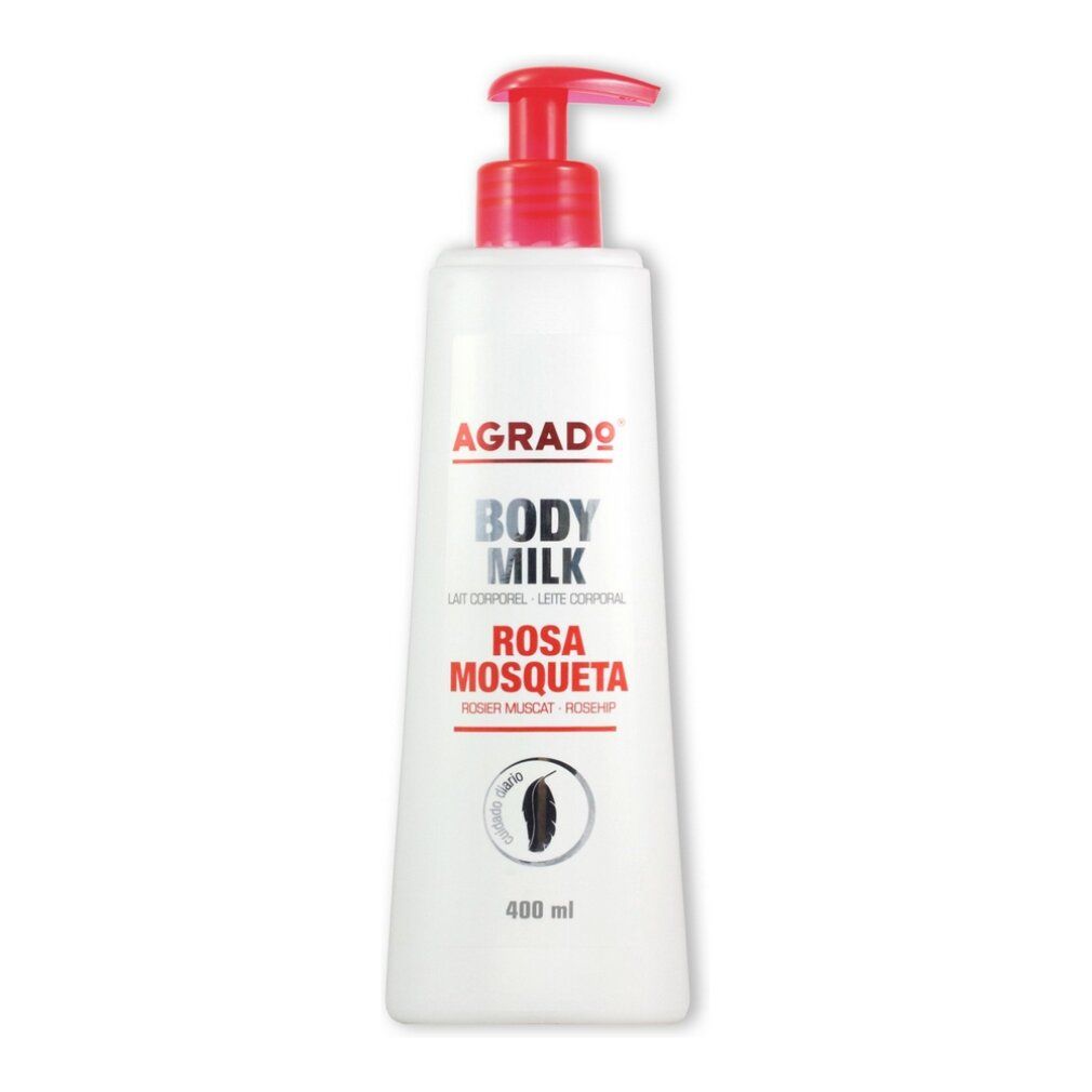 Weiße Flasche mit rotem Pumpkopf. Aufschrift: Agrado Body Milk Rosa Mosqueta. Schwarzes Logo und 400 ml.