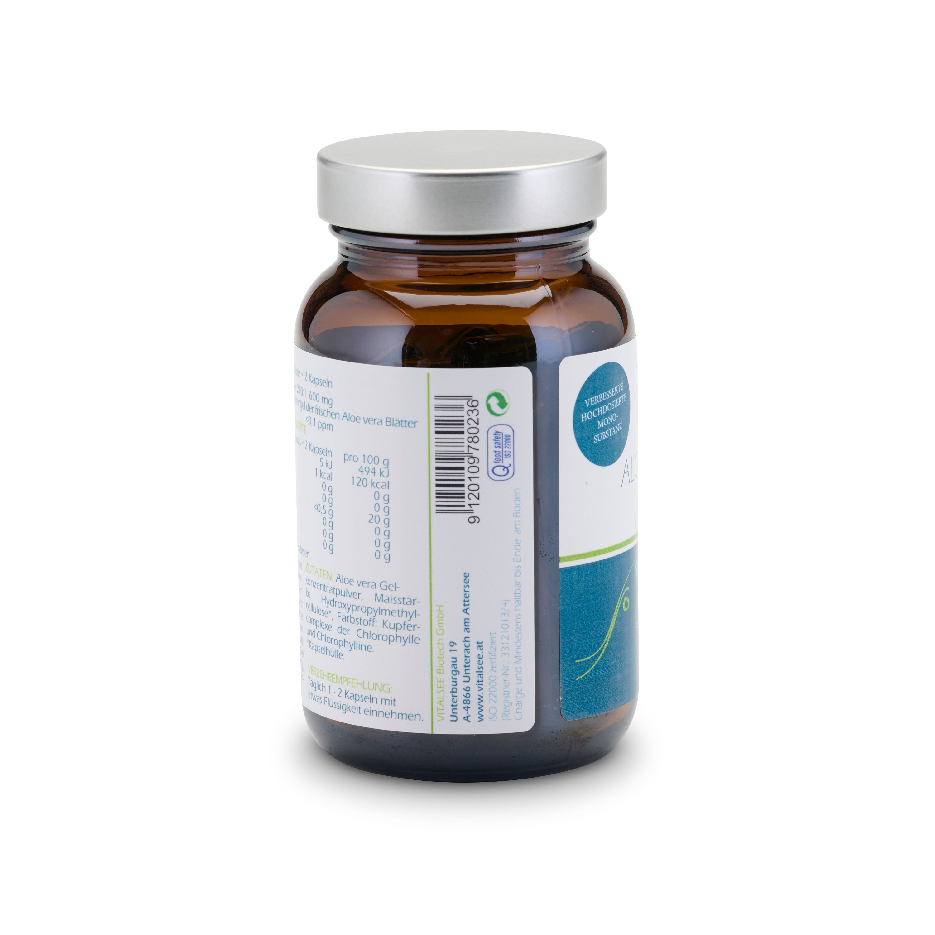 Rückansicht einer braunen Glasflasche mit silbernem Deckel. Etikett mit Barcode und Produktinformationen. Grünes und weißes Design.