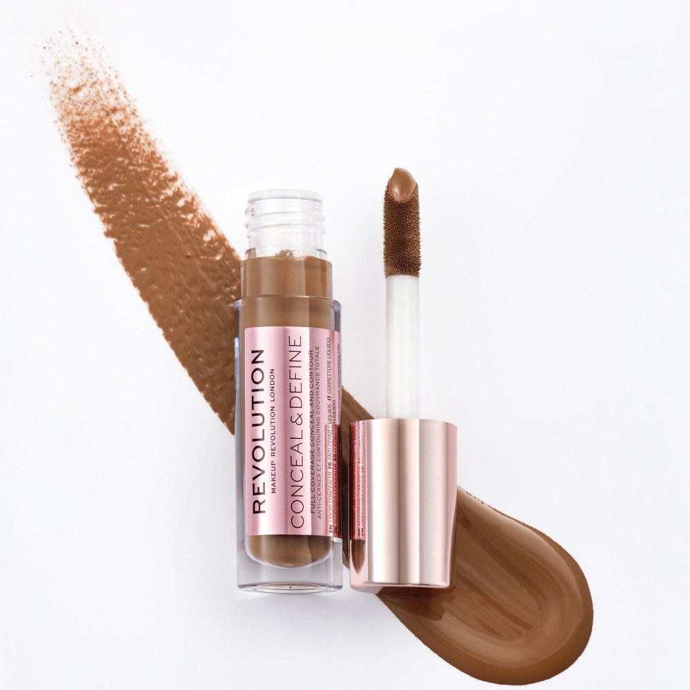 Concealer-Fläschchen mit Applikator. Farbton-Abstrich daneben.