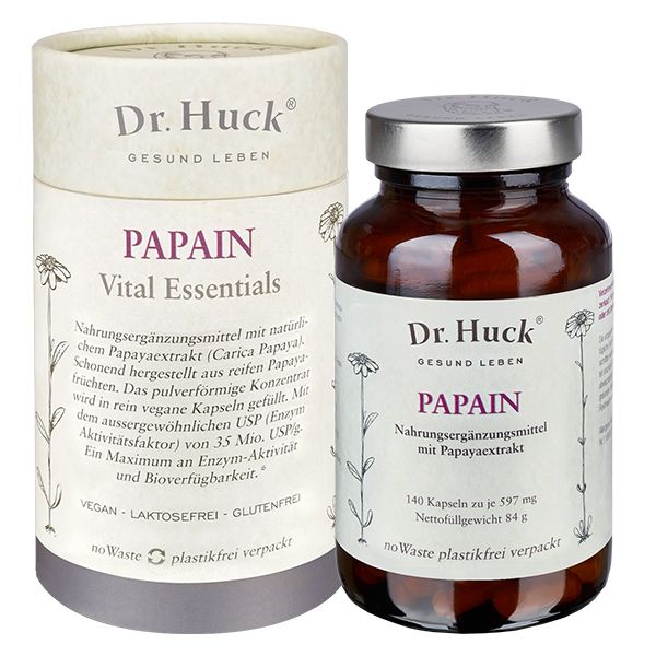 Zwei Behälter: eine runde Dose und eine braune Glasflasche. Beide tragen das Logo von Dr. Huck und die Aufschrift Papain.