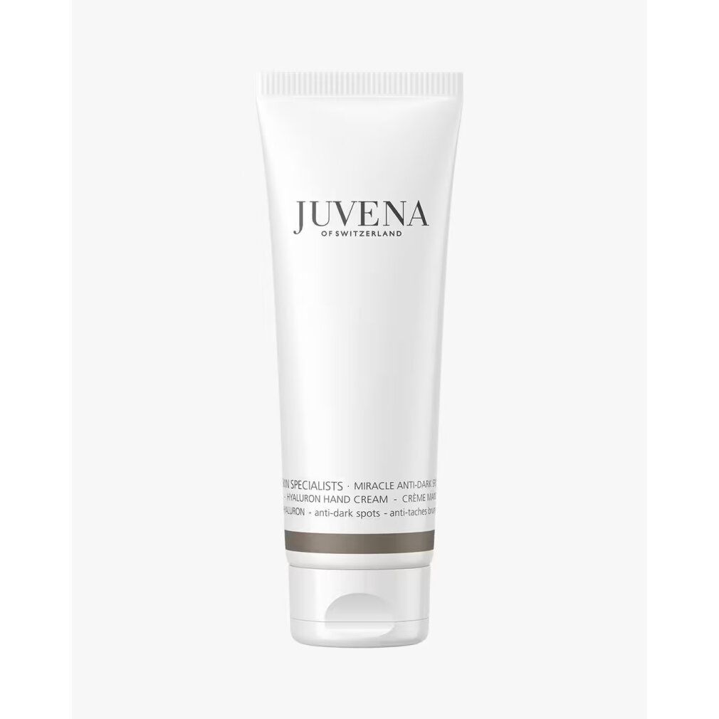 Weiße Tube mit Aufschrift JUVENA. Text: MIRACLE ANTI-DARK SPOT HYALURON HAND CREAM. Anti-Flecken.