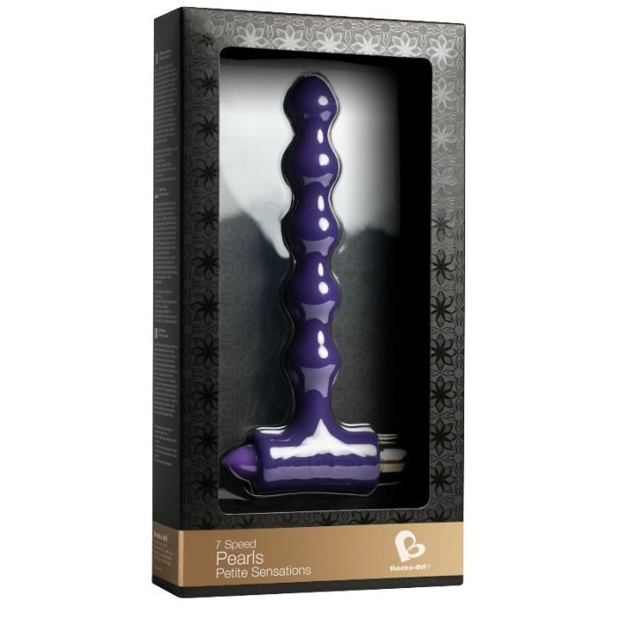 Lila Vibrations-Butt-Plug in schwarzer Verpackung. Mit 7 Speed Pearls und Petite Sensations beschriftet. Sichtfenster.