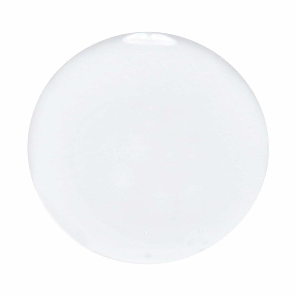 Klare, runde Flüssigkeit. Keine Verpackung sichtbar.