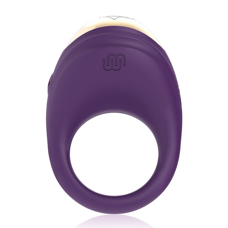 Vibrierender Ring, lila mit goldfarbenem Element. Ringförmiges Design mit abgerundeter Oberseite. Logo.