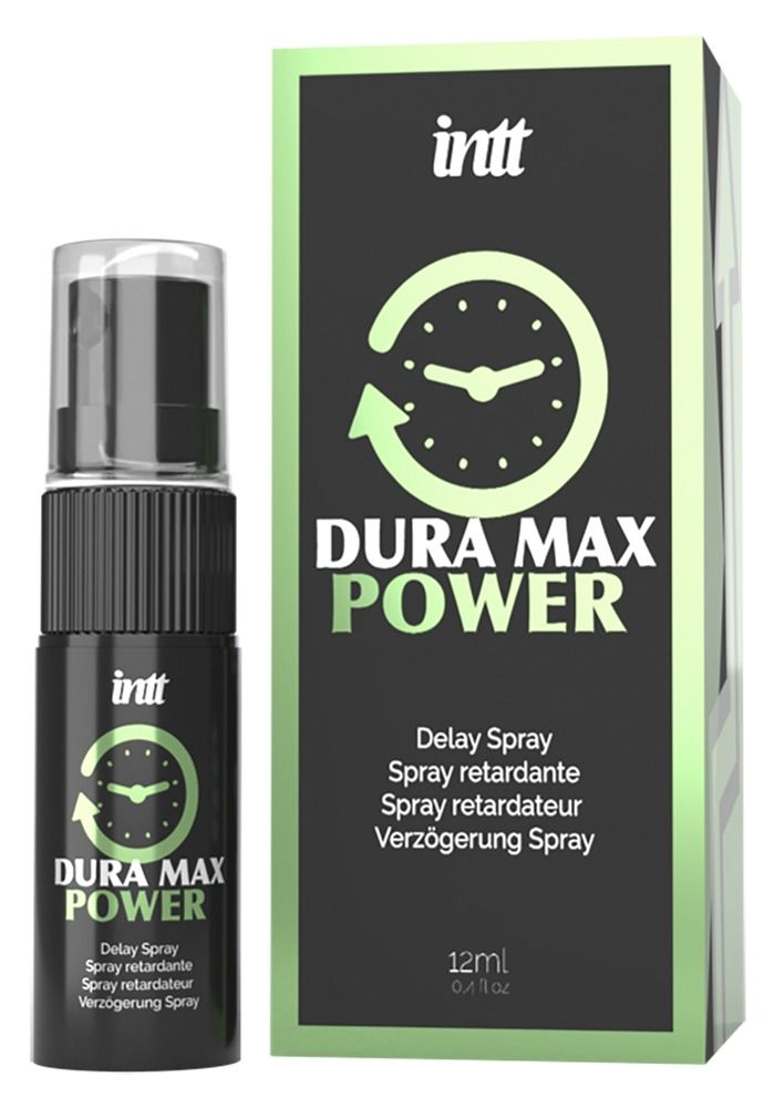 Schwarze Flasche und Verpackung mit "Dura Max Power"-Logo und Uhr-Symbol. Produktname und "Delay Spray" in Grün.