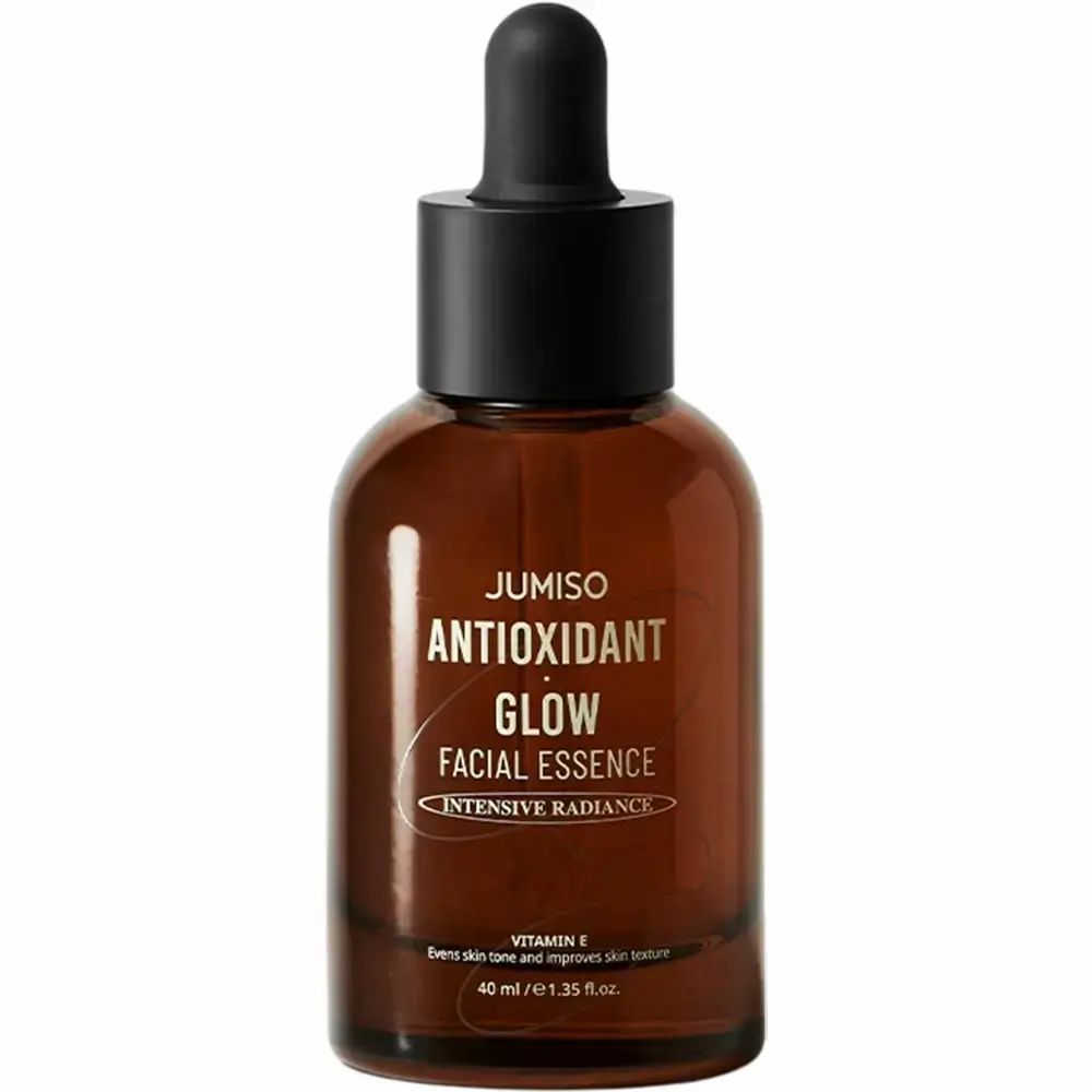Braune Glasflasche mit schwarzem Deckel und Pipette. Aufschrift: JUMISO ANTIOXIDANT GLOW FACIAL ESSENCE.