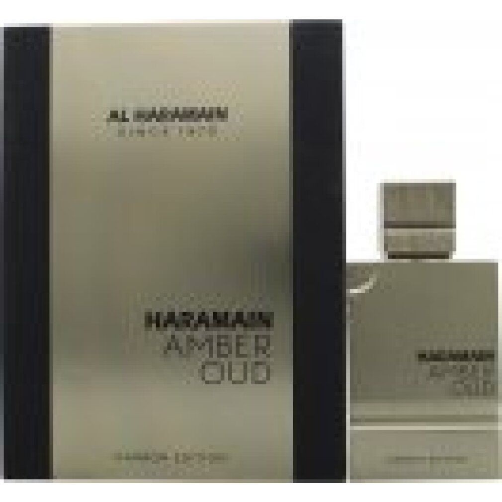 Parfümflakon und Verpackung. Silberfarbenes Design mit Schriftzug HARAMAIN AMBER OUD CARBON EDITION. Schwarze Verpackung.
