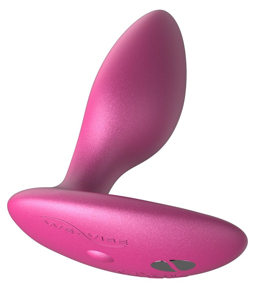 Rosa Analplug. We-Vibe Logo. Abgerundete Form mit breiter Basis. Produktansicht von der Seite.
