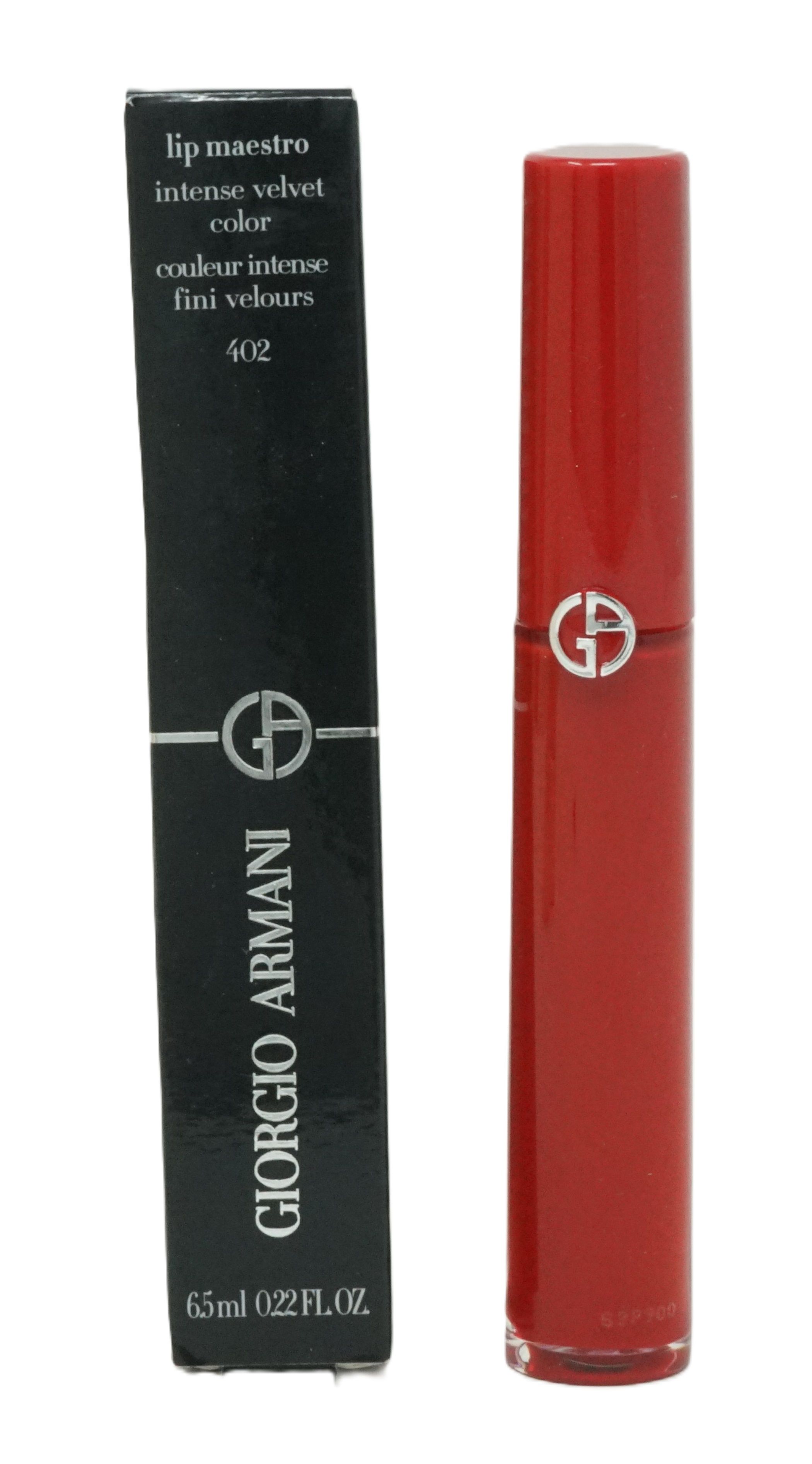 Roter Lippenstift und schwarze Verpackung. Auf der Verpackung steht "Giorgio Armani" und "lip maestro intense velvet color".
