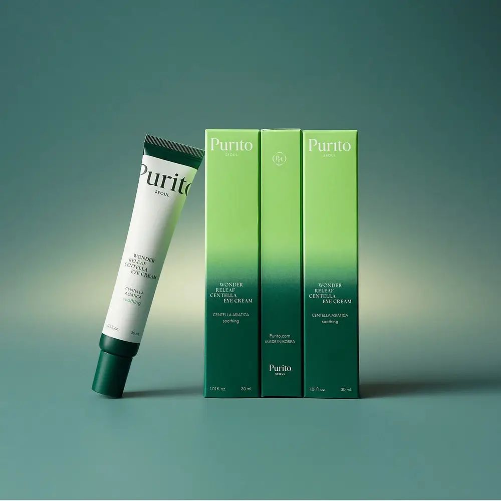 Produkt-Set mit Tube und drei Schachteln. Text: PURITO, Wonder Releaf Centella Eye Cream. Grün-weiße Farbgebung.
