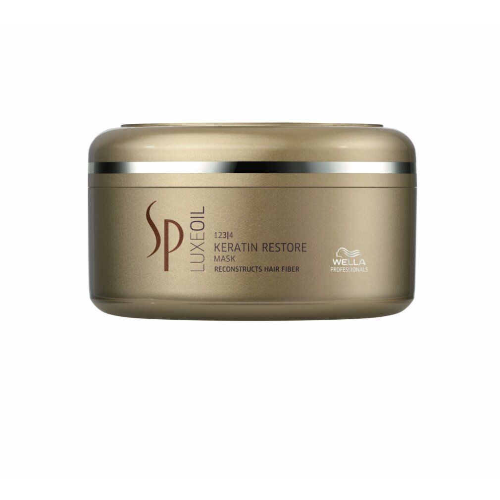 Goldfarbene Dose mit silbernem Band. Aufschrift: SP Luxeoil, Keratin Restore Mask, Wella Professionals.