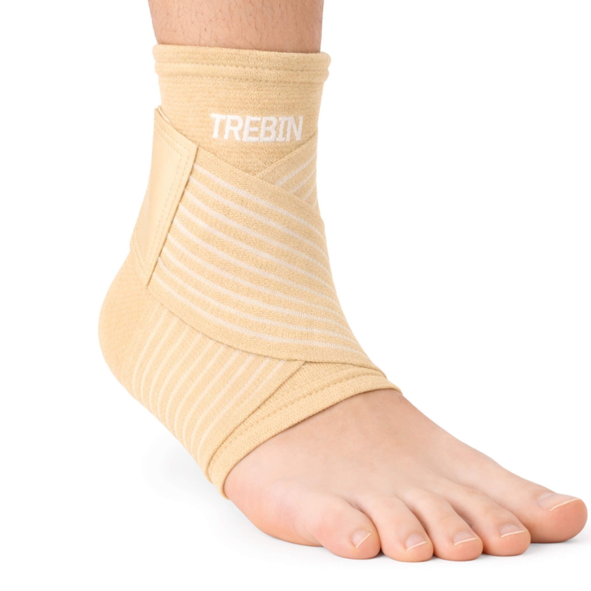 Beiger Knöchelbandage mit weißem Markennamen 'TREBIN'.