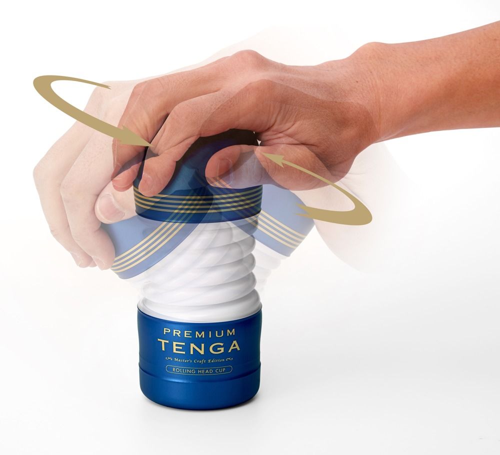 Hand hält ein blau-weißes Produkt. Auf dem Produkt steht "PREMIUM TENGA". Rotierende Pfeile zeigen die Bewegung an.