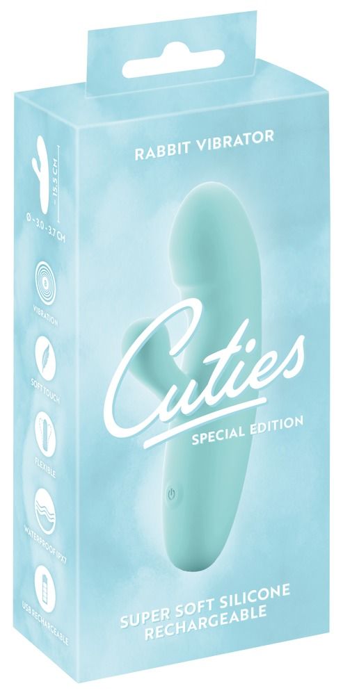 Verpackung eines türkisfarbenen Vibrators. Produktname 'Cuties'. Text: 'Super Soft Silicone'.