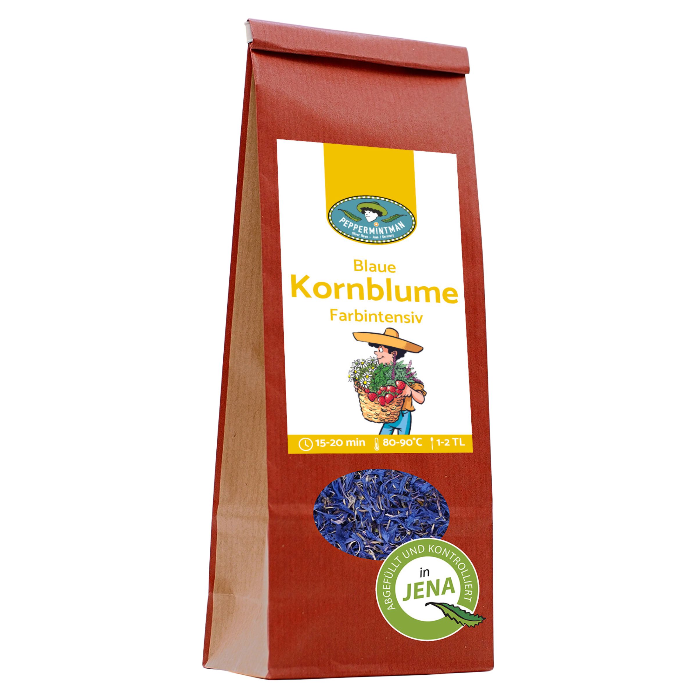Braune Papiertüte mit weißem Etikett. Aufschrift: Blaue Kornblume. Logo: PEPPERMINTMAN. Sichtfenster mit blauen Blüten. Siegel: Gefüllt und kontrolliert in Jena.