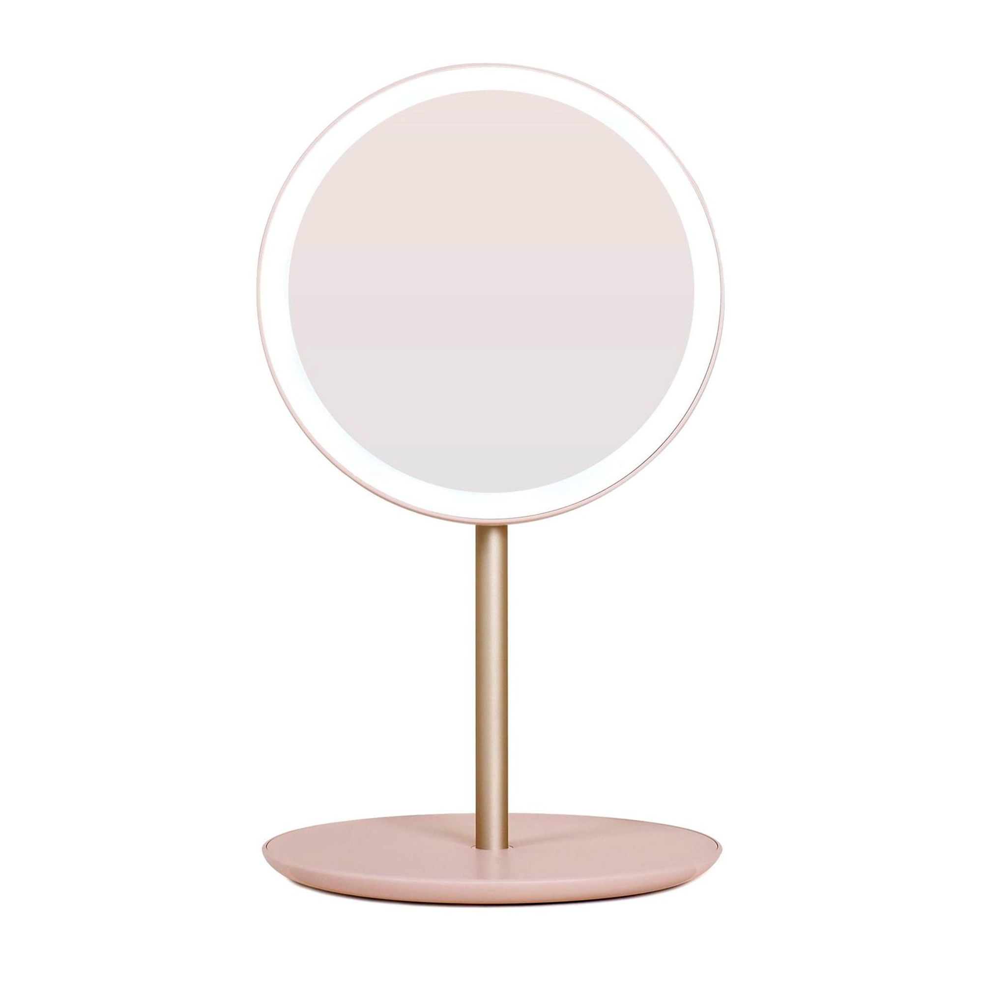 Runder, rosafarbener LED-Spiegel mit goldenem Stiel und Fuß. Der Spiegel ist beleuchtet.