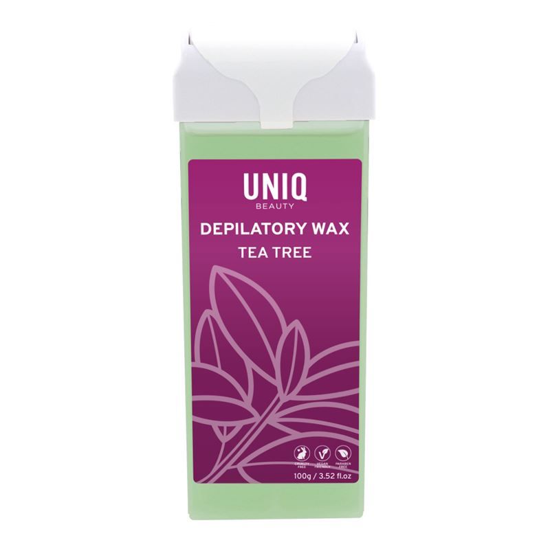Grüne Wachspatrone mit weißem Deckel. Aufschrift: UNIQ, Depilatory Wax Tea Tree. Lila Etikett mit Blättern.