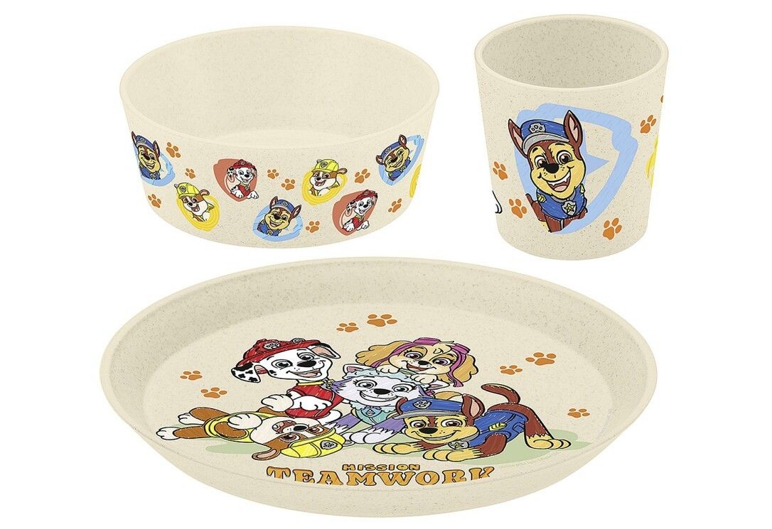 Dreiteiliges Kindergeschirr-Set. Enthält eine Schüssel, einen Becher und einen Teller. Mit Paw Patrol-Motiven und Pfotenabdrücken.