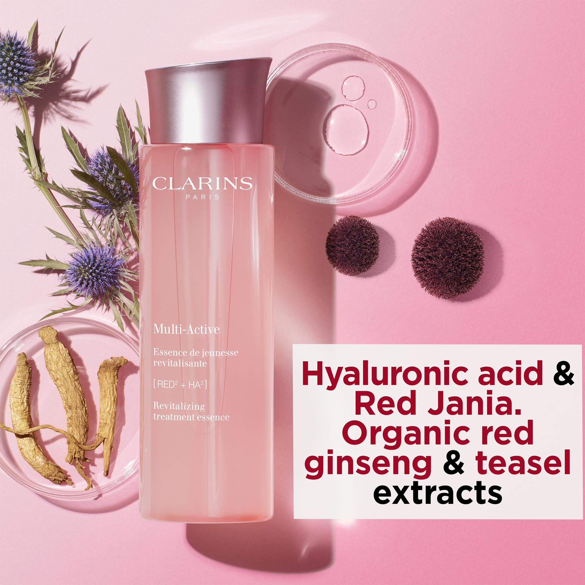 Clarins Multi-Active Essenz. Rosa Flasche mit silbernem Deckel. Text: Multi-Active, Revitalizing treatment essence. Zusätze: Kräuter, Extrakte.