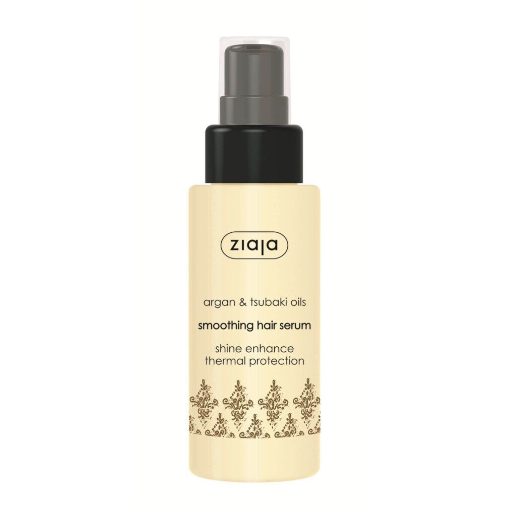 Beige Flasche mit schwarzem Sprühkopf. Aufschrift: ZIAJA, Argan & Tsubaki Öle, Smoothing Hair Serum, Shine Enhance, Thermal Protection.