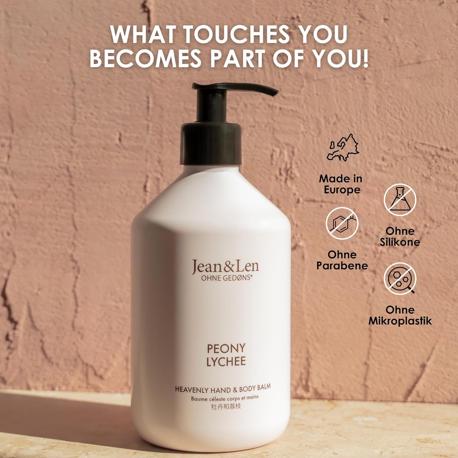Flasche mit schwarzem Pumpkopf. Aufschrift: Jean & Len, Peony Lychee. Symbole: Made in Europe, ohne Silikone, Parabene, Mikroplastik.