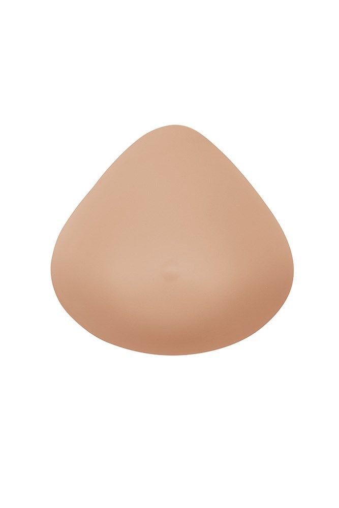 Beige Brustprothese, tropfenförmig.  
