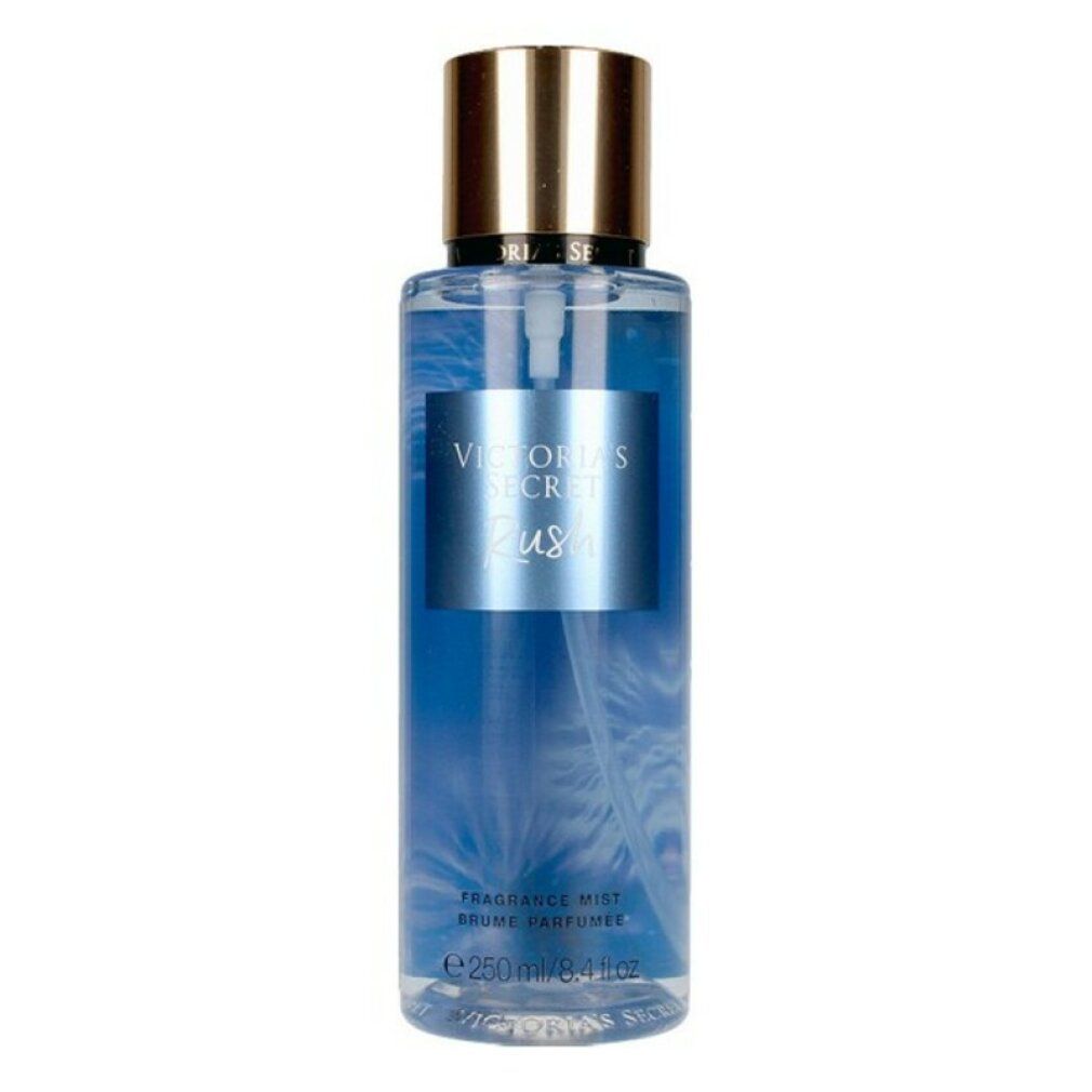 Blauer Flakon mit goldfarbenem Deckel. Aufkleber mit "Victoria's Secret Rush". 250 ml.