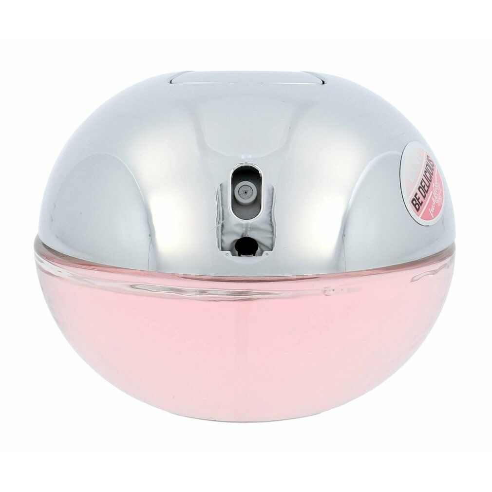 Runder Flakon mit silbernem Deckel und rosa Flüssigkeit. Sprühkopf sichtbar.