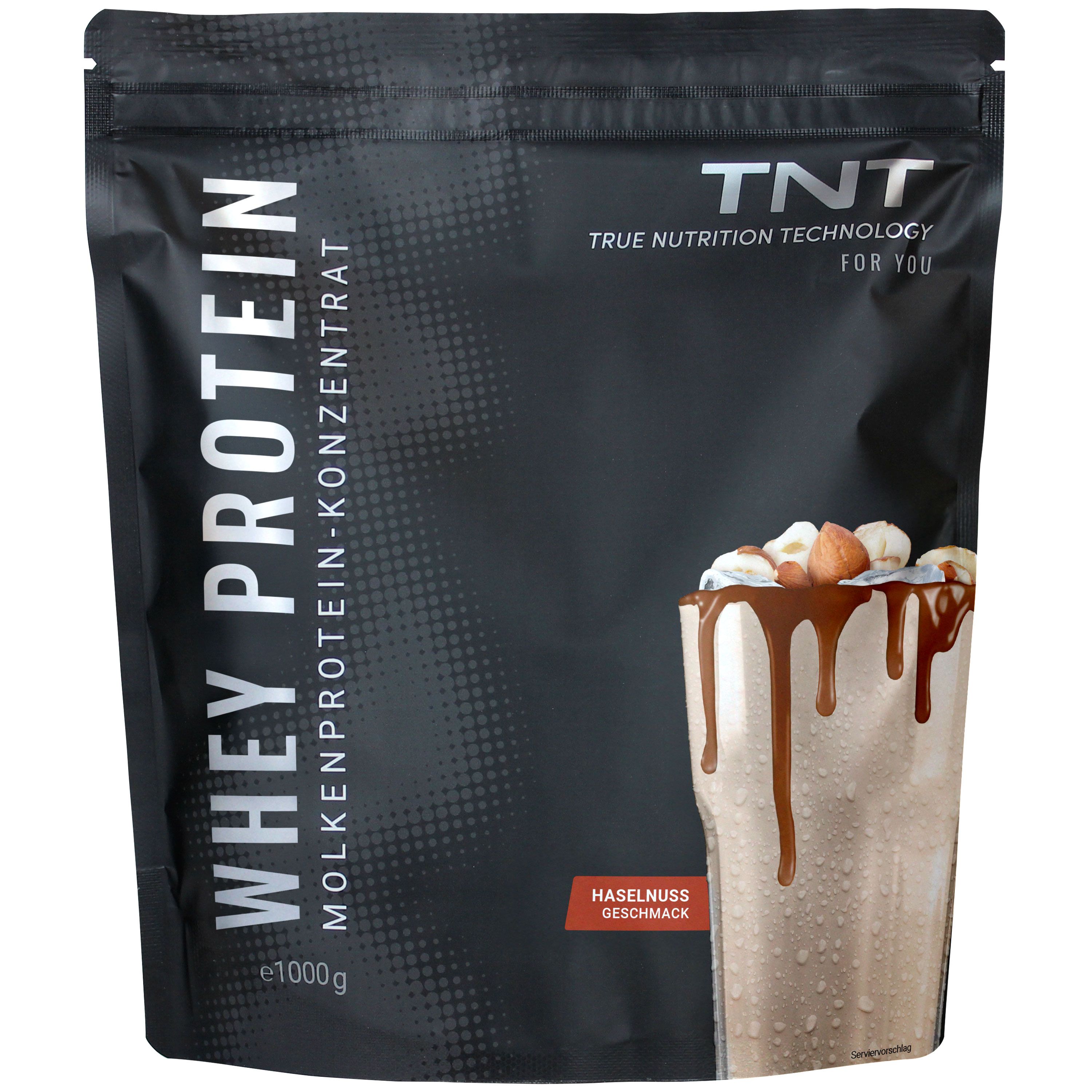 Schwarze Tüte mit TNT Whey Protein Konzentrat. Aufdruck: Whey Protein, Molkenprotein-Konzentrat, Haselnuss Geschmack. Abbildung eines Shakes.