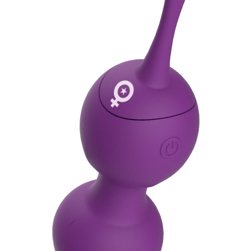 Nahaufnahme eines lila Vibro-Balls mit Schlaufe. Mit einem Ein-/Ausschalter und einem Symbol.
