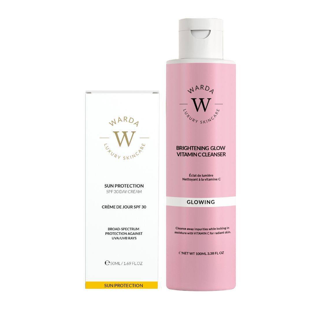 Rosa Flasche und weiße Schachtel. Aufschrift: Warda Luxury Skincare, Vitamin C Cleanser, SPF 30 Day Cream. Sonnenschutz.