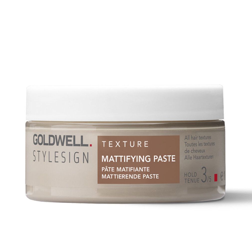 Goldwell Stylesign Texture Mattierende Paste. Beige Dose mit weißem Deckel. Produktname und Marke deutlich sichtbar.