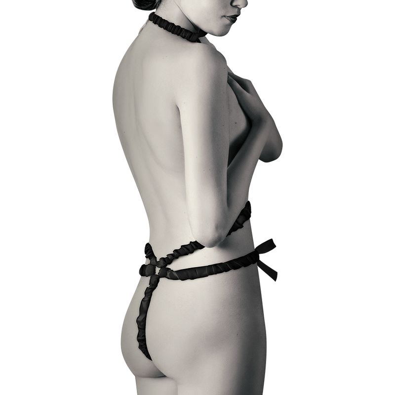 Schwarzes Dessous-Set von hinten. Set mit Schleife am Rücken und Halsband. Rückansicht.