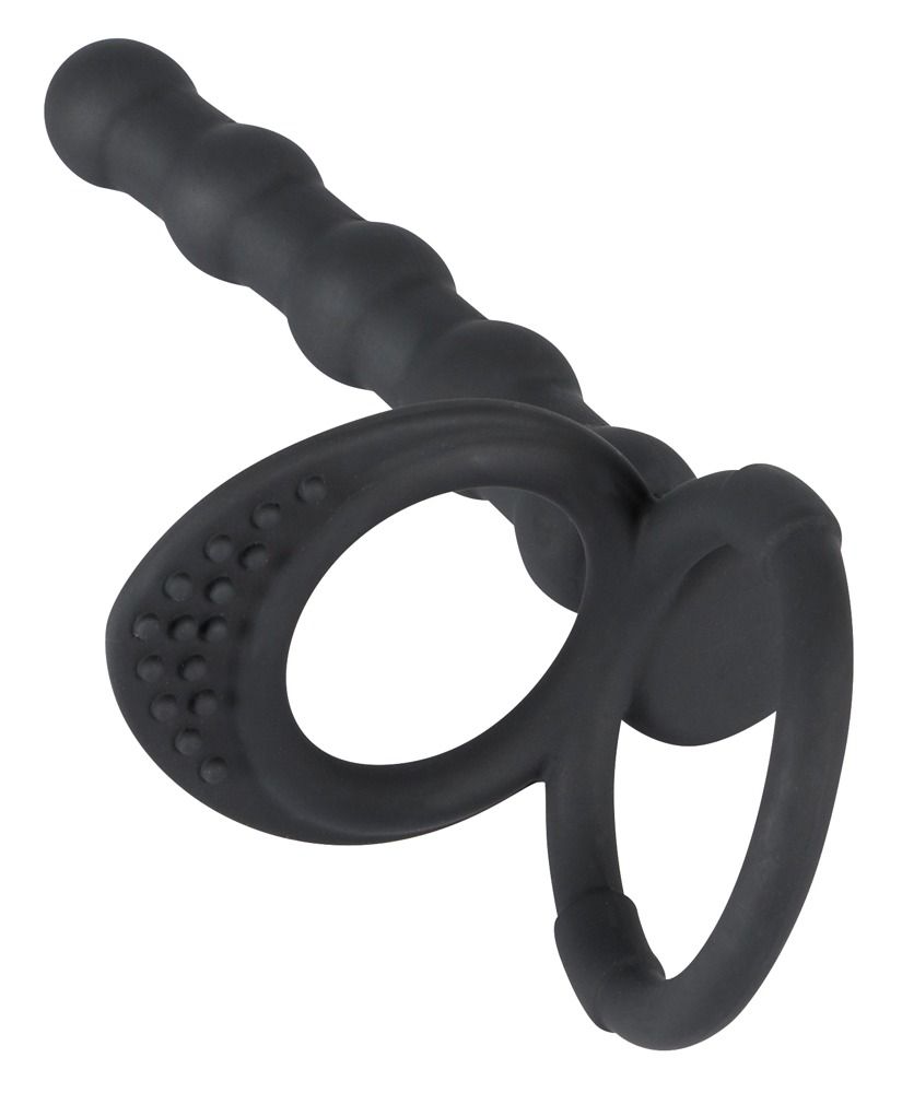 Schwarzer Penis- und Hodenring mit Analdildo. Ring mit Noppen, Dildo mit geriffelter Oberfläche. Aus Silikon.