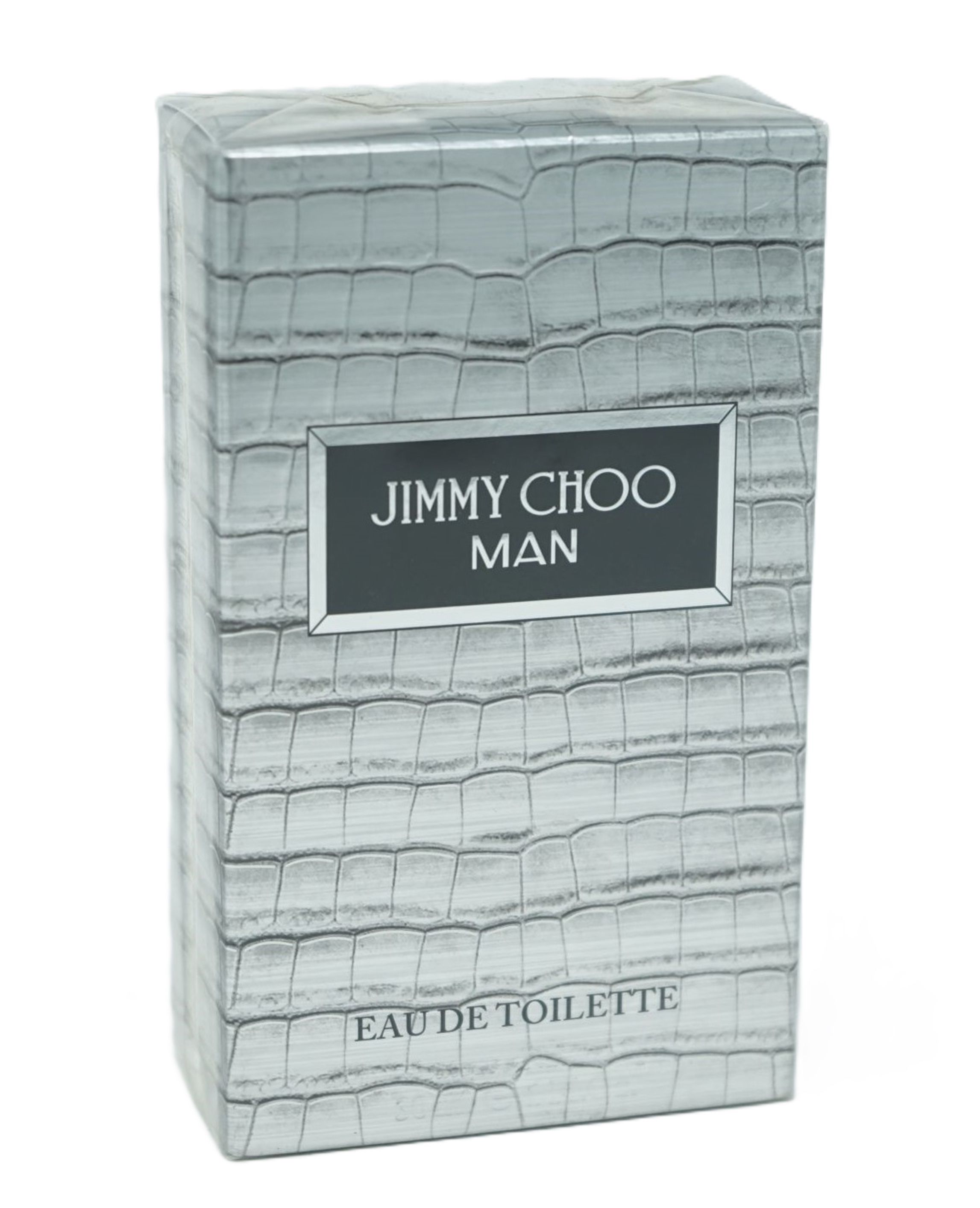 Graue rechteckige Schachtel mit Krokodilmuster. Auf der Vorderseite steht in einem schwarzen Rechteck „JIMMY CHOO MAN“ und „EAU DE TOILETTE“.