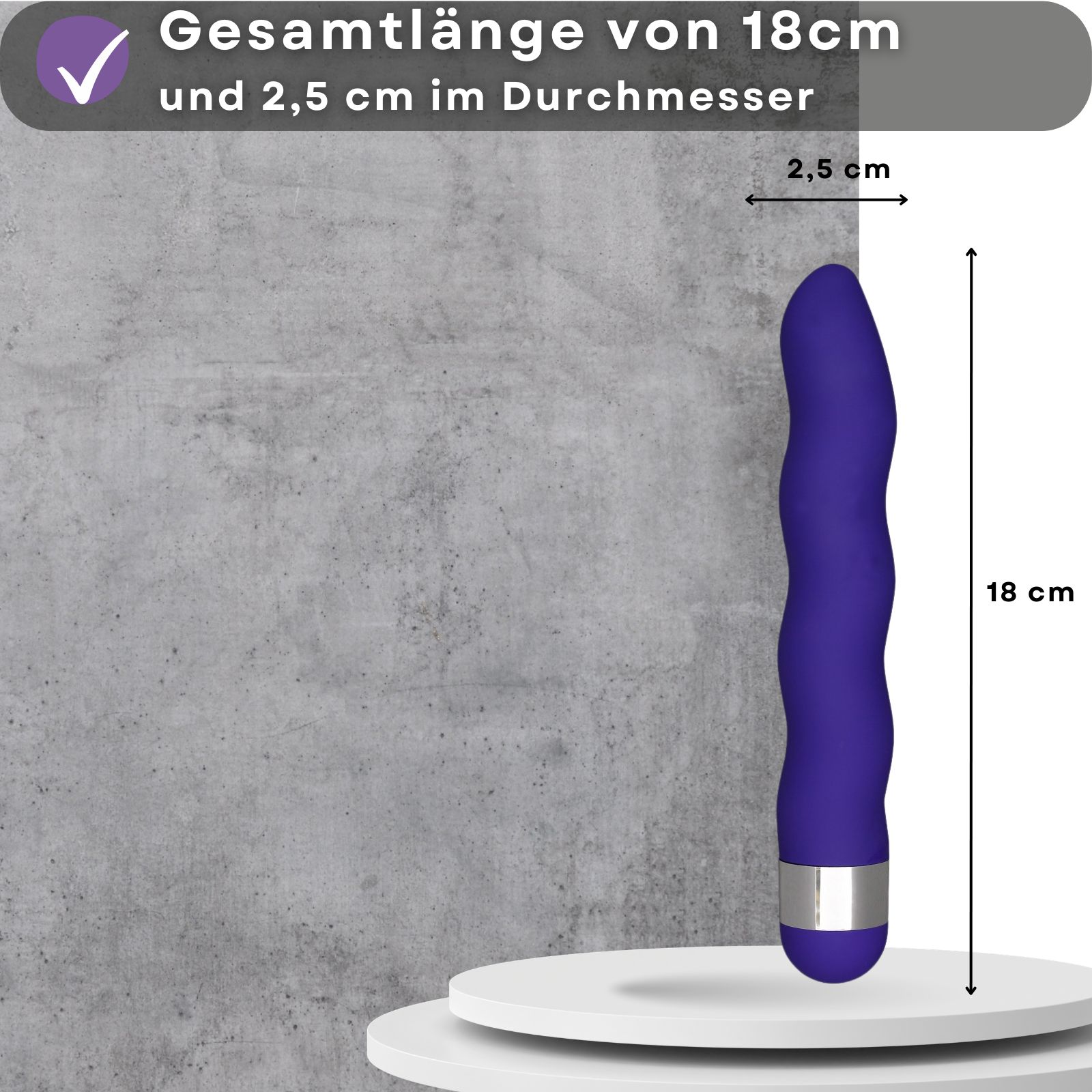 Blauer Vibrator. Wellenform, 18 cm lang, 2,5 cm Durchmesser. Auf Podest. Maße angezeigt.