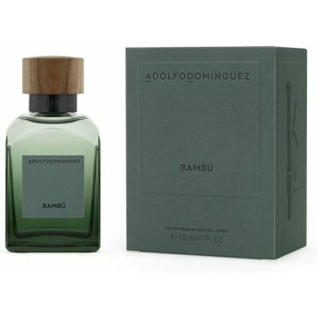 Grüne rechteckige Flasche und Schachtel. Auf der Schachtel steht "Bambú". Flasche mit Holzdeckel. Marke ADOLFO DOMINGUEZ.