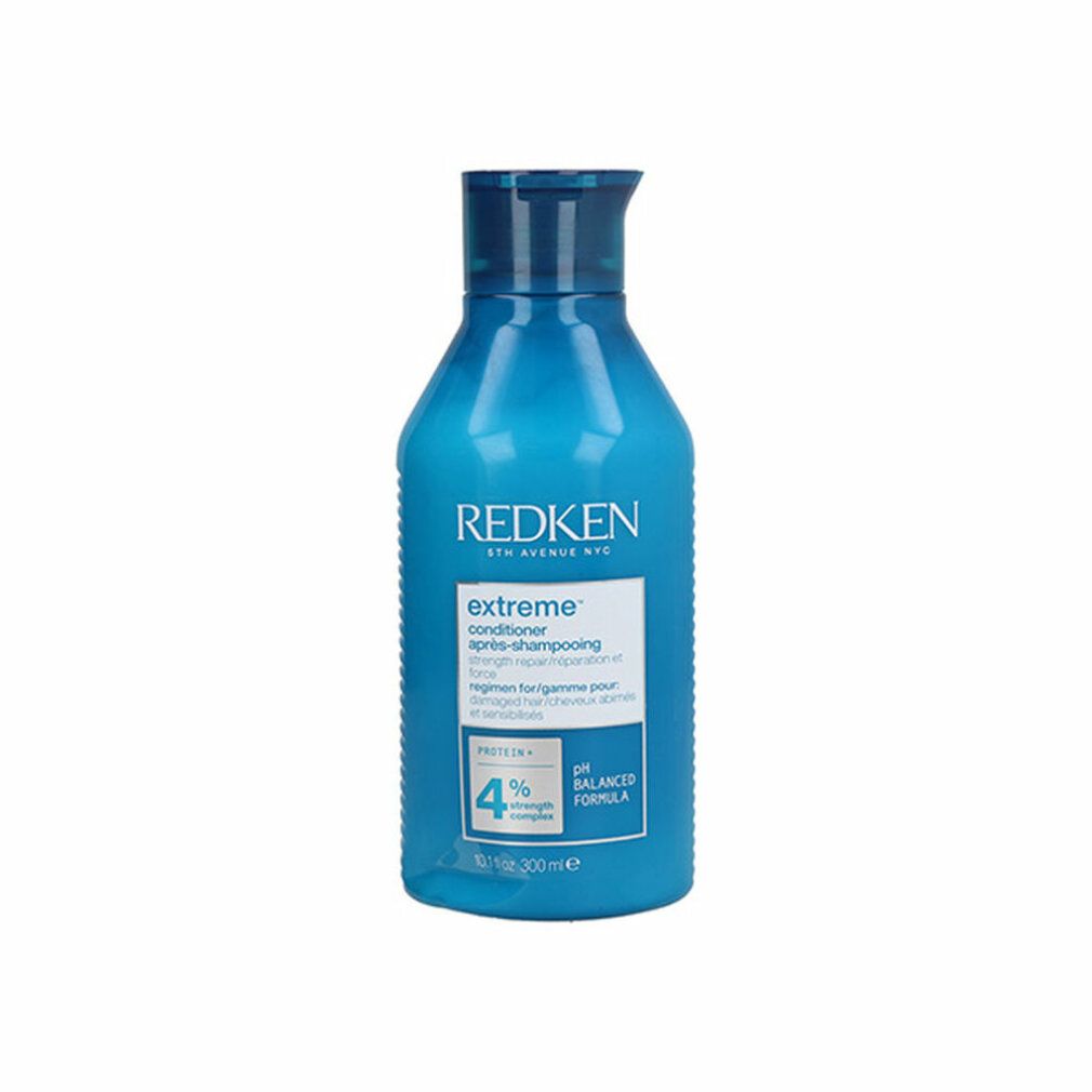 Blaue Flasche Redken Extreme Conditioner. Enthält 300 ml. Aufschrift: Extreme, pH Balanced Formula, 4% Strength Complex.