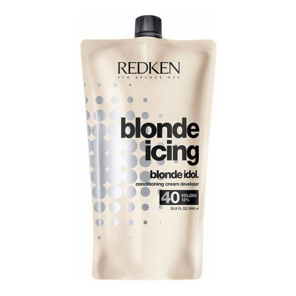 Beutel mit schwarzem Verschluss. Aufschrift: REDKEN, blonde icing, blonde idol, 40 Volume 12%.