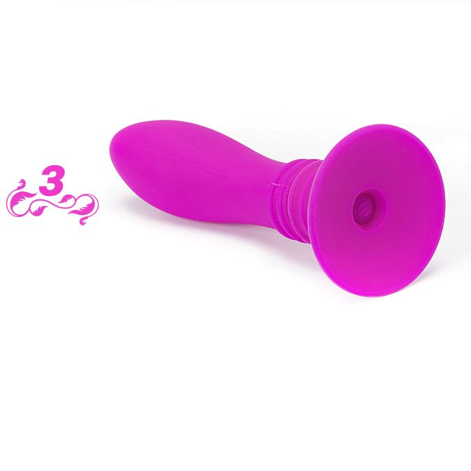 Pinkfarbener Anal Plug mit Saugnapf. Auf weißem Hintergrund.
