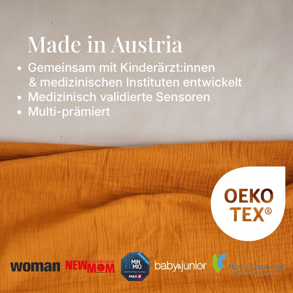Text: Made in Austria. Auflistung von Merkmalen und Logos: Öko-Tex, woman, NEW MOM, MIN MIO, baby&junior, Holz-Lernwelten.
