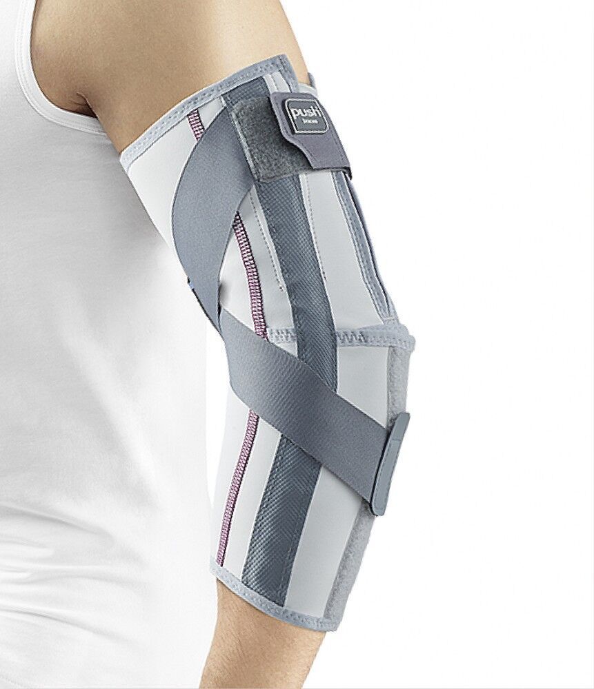 Ellenbogenbandage am Arm. Weiß-grau mit grauen Gurten. Klettverschluss. Push-Logo. Person trägt weißes T-Shirt.